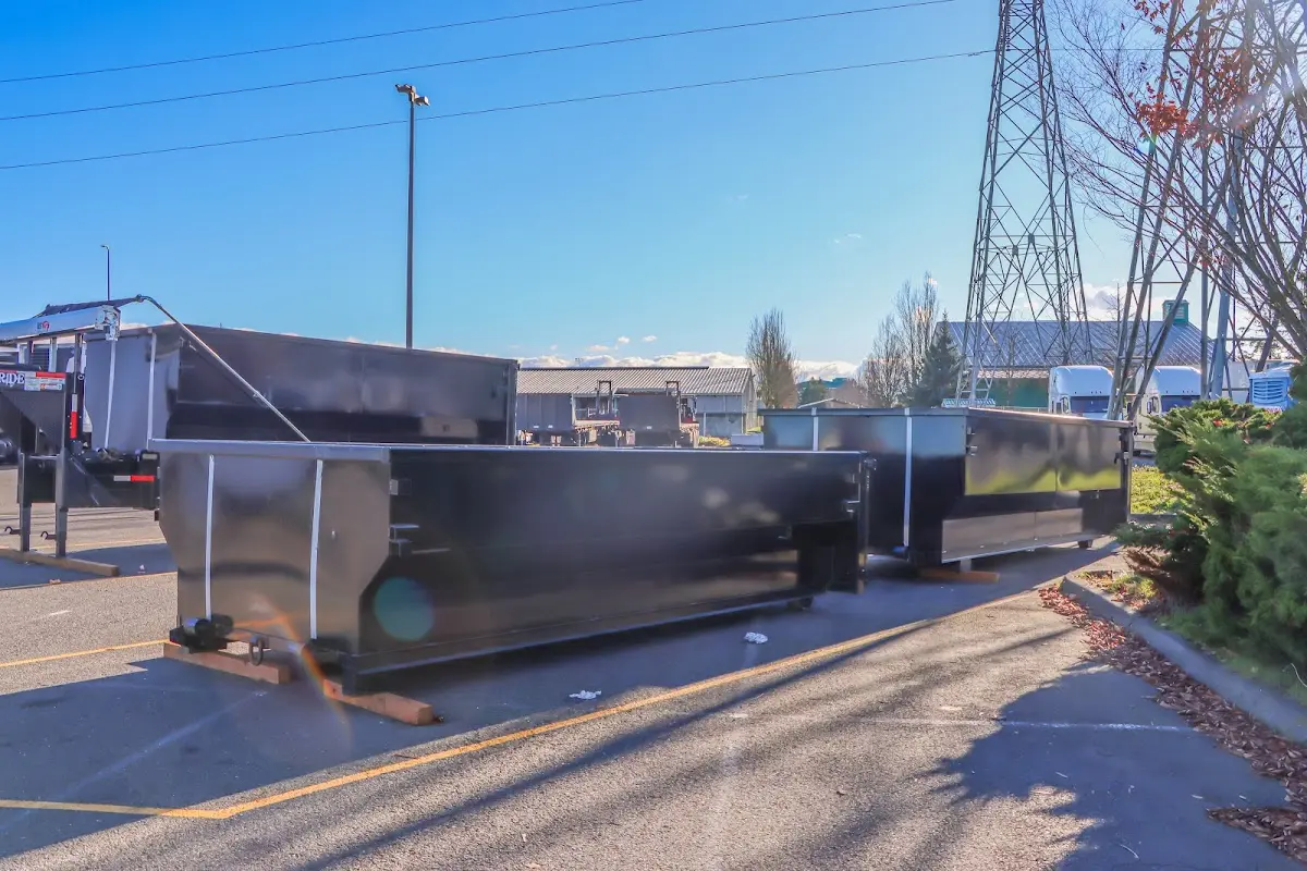 Roll-off dumpster ready for waste disposal at job site for Yard Waste Dumpster Rental in Shoreline